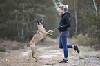 young woman with Malinois