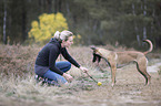 young woman with Malinois