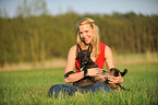 woman with Miniature Bull Terrier