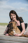 woman and Olde English Bulldog