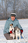 woman and 2 Parson Russell Terrier