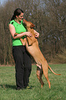 woman with Rhodesian Ridgeback