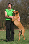 woman with Rhodesian Ridgeback