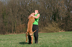 woman with Rhodesian Ridgeback