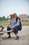 woman and Rhodesian Ridgeback