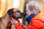 woman with Rhodesian Ridgeback