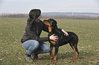 woman and Rottweiler