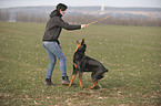 woman and Rottweiler