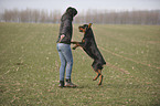 woman and Rottweiler