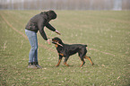 woman and Rottweiler