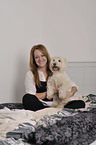 woman with West Highland White Terrier