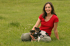 woman with Jack Russell Terrier puppies