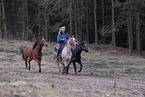 woman rides Appaloosa