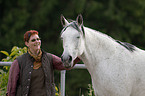 woman and arabian horse