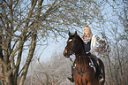 woman with bavarian warmblood