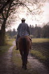 woman rides Dutch Warmblood