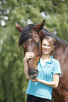 woman and english thoroughbred