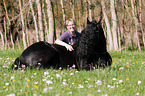 woman and Friesian horse