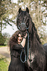 woman and Frisian Horse