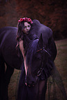 young woman with Frisian Horse
