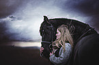 woman with Friesian Horse
