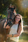 woman and German Riding Pony