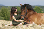 woman and German Riding Pony