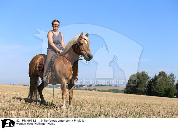 Frau reitet Haflinger / woman rides Haflinger Horse / PM-06782