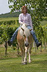 woman with Haflinger horse