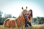 woman and Haflinger horse