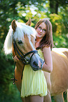 woman and Haflinger horse