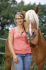 woman and Haflinger