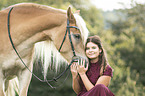 woman and Haflinger