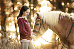 woman and Haflinger