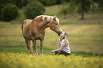 woman and Haflinger