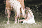 woman and Haflinger