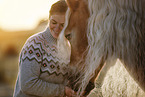 woman and Haflinger horse