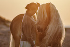 woman and Haflinger horse