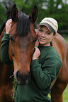 woman with Hannoveraner horse