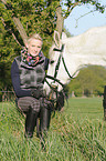 woman with Hanoverian horse