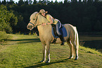 woman rides Icelandic horse