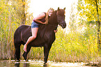 woman and Icelandic horse