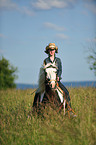 woman rides horse