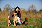 woman with 2 dogs