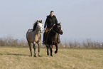 woman rides Quarter Horse