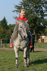 girl with shetland pony