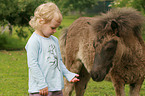 child with Shetland Pony