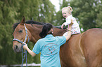 woman, child and warmblood