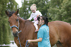 woman, child and warmblood