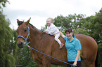 woman, child and warmblood